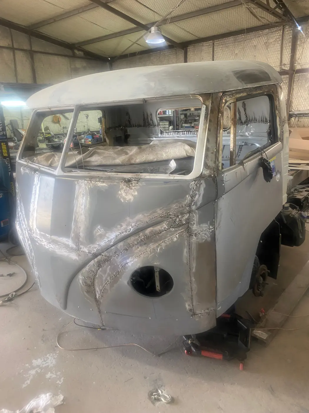 Hand-formed VW cab during the bodywork stage